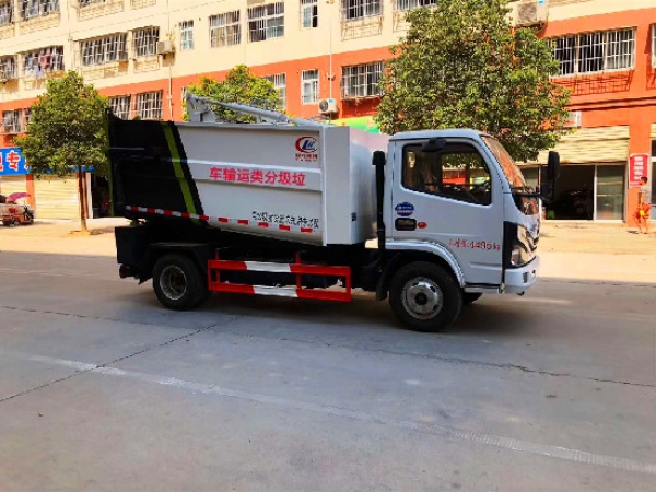 東風(fēng)小多利卡國(guó)六后掛桶無(wú)泄漏壓縮垃圾車(chē)