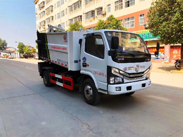 東風(fēng)小多利卡國(guó)六后掛桶無(wú)泄漏壓縮垃圾車(chē)