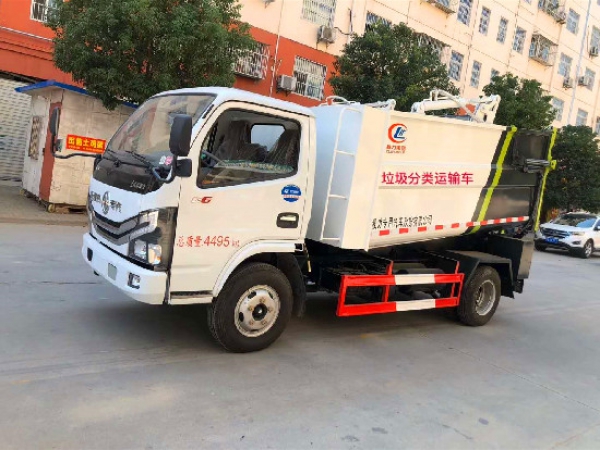 東風(fēng)小多利卡國(guó)六后掛桶無(wú)泄漏壓縮垃圾車(chē)